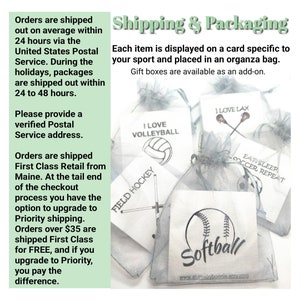 May include: A close-up of a variety of sports-themed gift bags. Each bag features a different sport, including volleyball, field hockey, lacrosse, soccer, and softball. The bags are made of a sheer, organza fabric and are decorated with a card featuring the sport's name and a graphic design. The text "Eat Sleep Soccer Repeat" is visible on one of the bags.