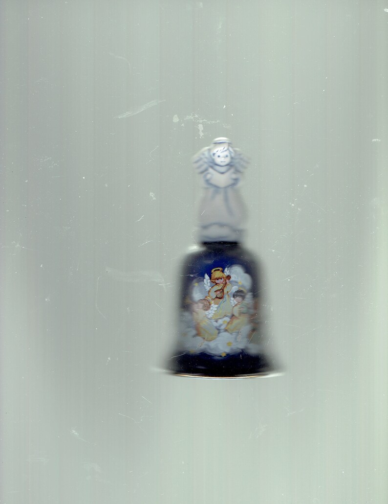 avon 1992 bell with jesus/' children band playing