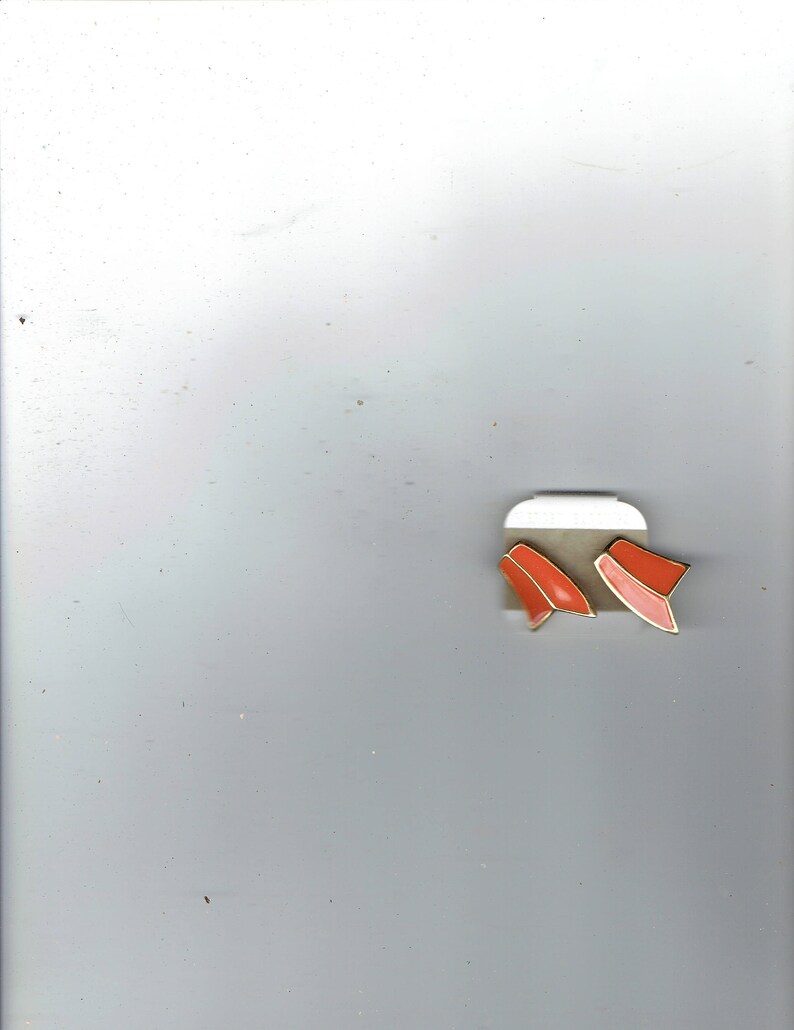 orange colored earrings 1980