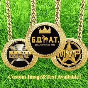 May include: Gold-colored pendant necklaces with various designs, including "MVP" with a baseball and bat, a star, and "G.O.A.T." with a crown and goat. The text "Custom Image & Text Available!" is also visible.