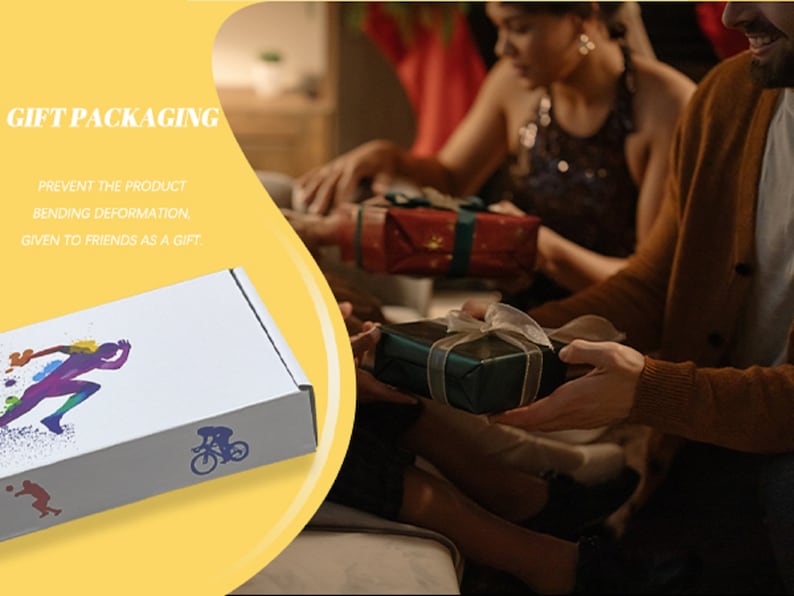 Puede incluir: Una caja blanca con gr&aacute;ficos coloridos de un corredor, un ciclista y un jugador de baloncesto. La caja tiene el texto "GIFT PACKAGING" y "PREVENT THE PRODUCT BENDING DEFORMATION, GIVEN TO FRIENDS AS A GIFT."