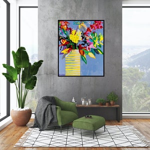 May include: A colorful abstract painting of a bouquet of flowers in a yellow vase on a blue background.