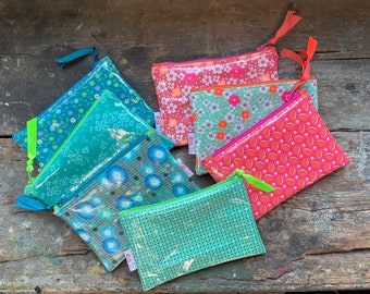 Small Petit Pan coated canvas bags.