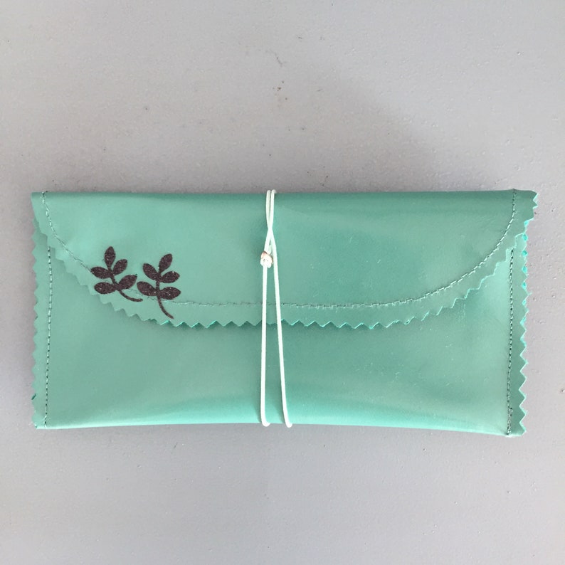 Small light green leather pouch