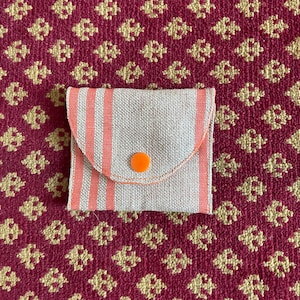 Petit porte-monnaie ou porte-cartes.
