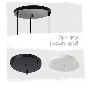 May include: Black and white ceiling mount plates for a triple drop hardwire light fixture install.  The text "triple drop hardwire install" is visible in the image.