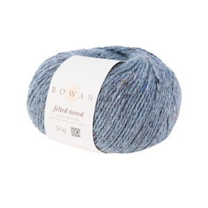 May include: A ball of Rowan Felted Tweed yarn in a blue colorway. The label reads "Felted Tweed, a felted effect yarn made with merino wool & alpaca, 50g".