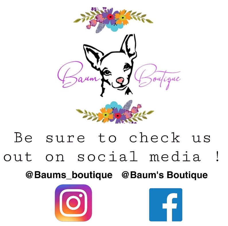 May include: A logo for a boutique called "Baum's Boutique" featuring a cartoon dog with floral accents. The text "Be sure to check us out on social media!" is below the logo. Social media icons for Instagram and Facebook are below the text. The Instagram icon is a white camera inside a circle with a pink background. The Facebook icon is a white "f" inside a blue square.