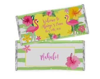 May include: Two candy bar wrappers with a tropical theme. One wrapper has a yellow background with pink flamingos, flowers, and the text "Welcome to Naiya's Luan May 12th, 2018". The other wrapper says "Mahalo!" with pink flowers.