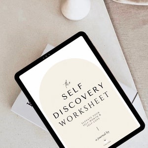 May include: A digital tablet displaying a self-discovery worksheet with the text "the SELF DISCOVERY WORKSHEET" and "ELEVATE YOUR SELF-WORTH & SELF-LOVE". The worksheet is a journal by "Love & Soul".