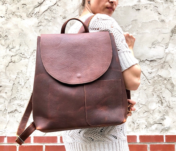 Brown leather top travel backpack