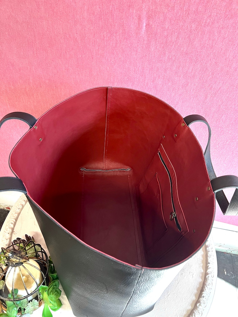 May include: A set of three ceramic vases in varying heights. The vases have a matte finish in shades of cream, beige, and brown. The tallest vase is approximately 25 cm tall.