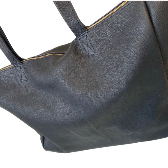 large black leather bag