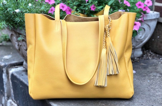 large yellow leather handbag