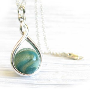 Dainty cremation ash pet memorial pendant necklace artisan handmade from glass and sterling silver ~ Eternity