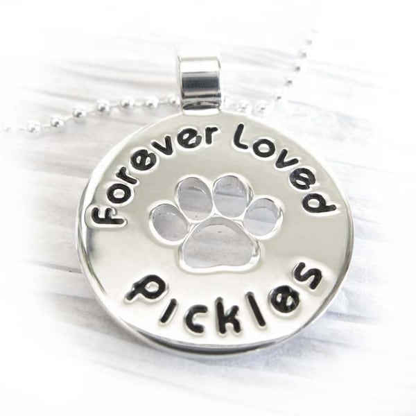 Pet memorial necklace. Personalized sterling silver Paw Prints pendant. Engraved keepsake for loss of pet. Sympathy gift. Mourning jewelry.