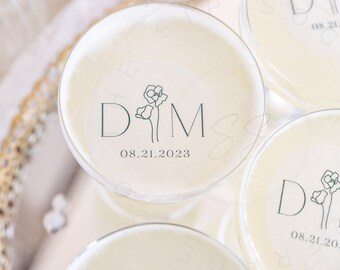 May include: Clear glass cups with a floral design and the initials "D & M" and the date "08.21.2023" printed on them.
