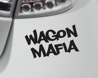 May include: Black and white decal sticker with the text "Wagon Mafia" in a graffiti style font.