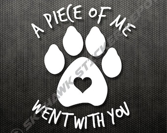 May include: White vinyl decal with a paw print and a heart in the center. The text reads "A piece of me went with you".