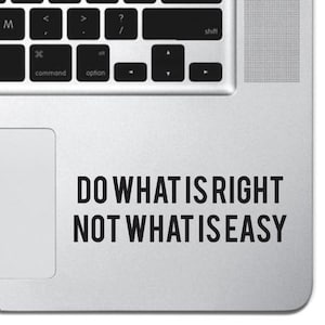 May include: A laptop computer with a silver finish and a black sticker that reads "DO WHAT IS RIGHT NOT WHAT IS EASY".