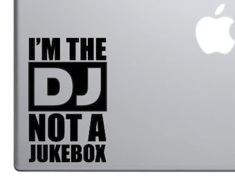 May include: Black and white sticker with the text "I'm the DJ not a jukebox".