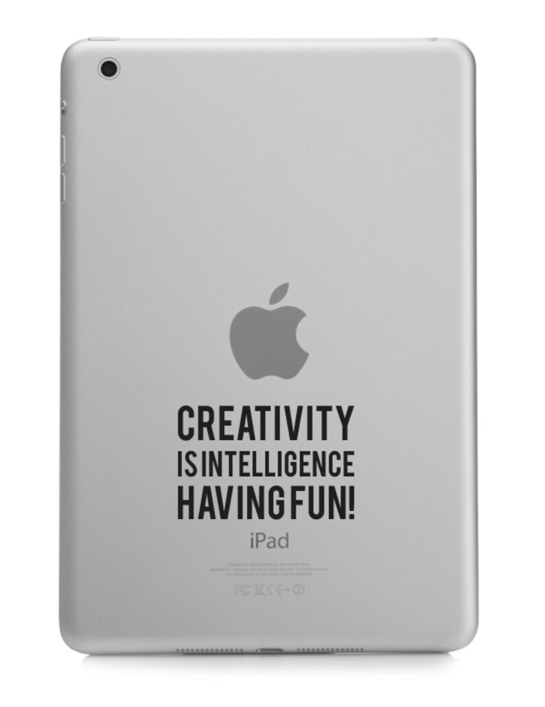 May include: A silver iPad with a black Apple logo and the text "CREATIVITY IS INTELLIGENCE HAVING FUN!" on the back.