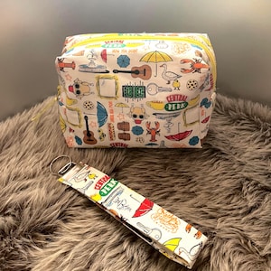 Bundle - Friends Central Perk White and Yellow Zippered Bag and Matching Wrist Lanyard Keychain Set