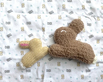 2 crocheted rattle rabbits