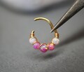 Gold opal Clicker 1.2mm (16ga) suitable for septum, daith, rook, conch, helix, cartilage 16g 18g 20g product logo