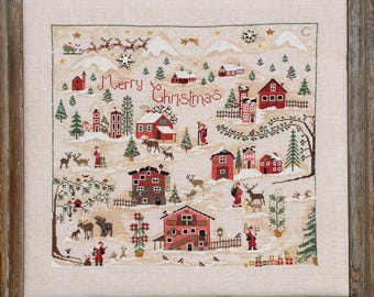 May include: A cross-stitch pattern featuring a winter village scene with red houses, snow-covered hills, and the text "Merry Christmas".