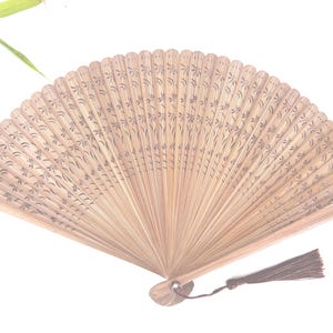 HIGH QUALITY hand fan Dragonfly Pattern Engraved Hand Fan with a Pouch ( Brown)