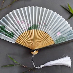 Lotus flowers and Lotus flower buds , Greenish  Silk Fan a Beautiful Handcrafted Box a Super Soft Fabric Pouch Folding Hand with bamboo ribs