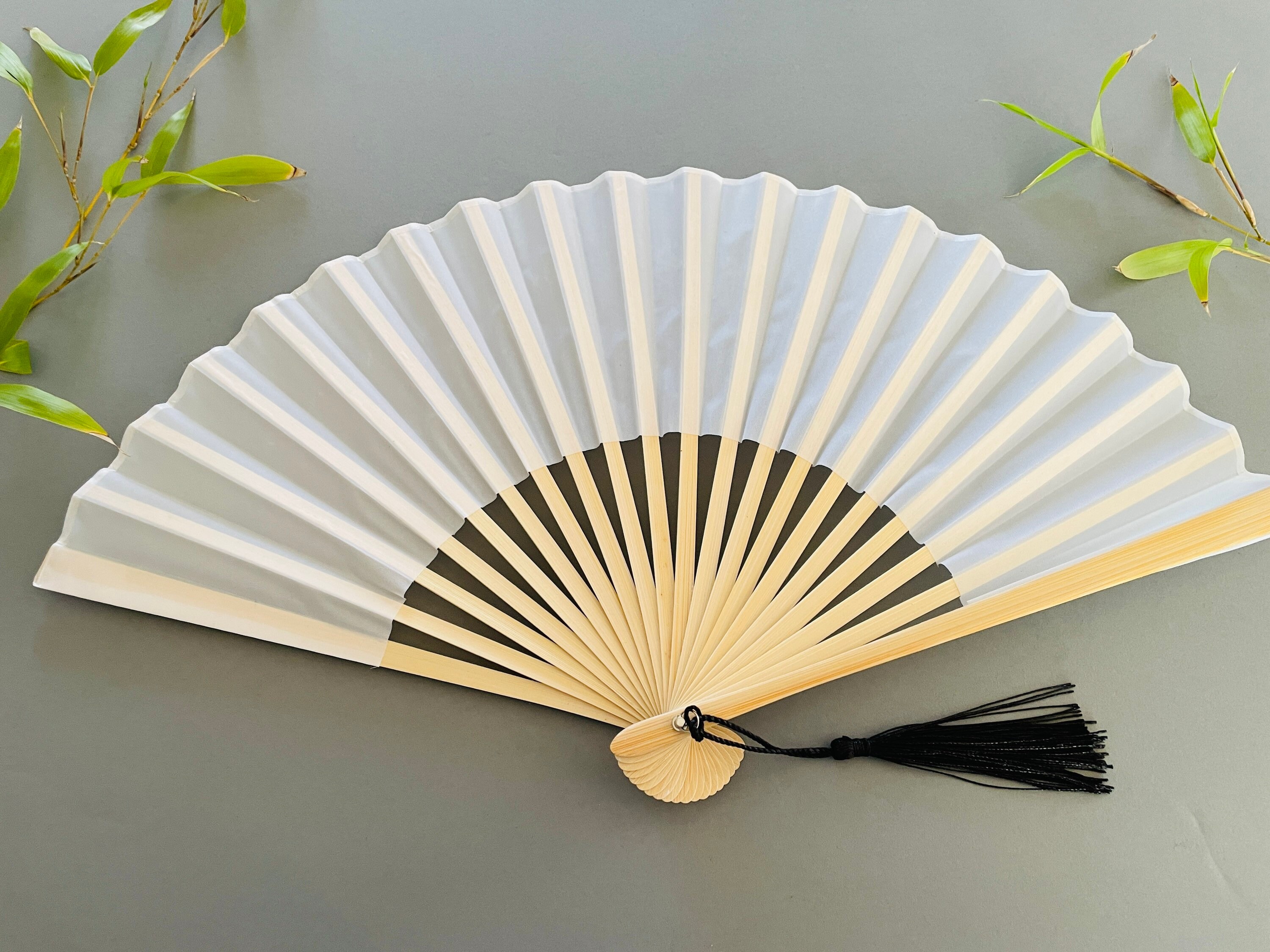 Black and white hand fan discount