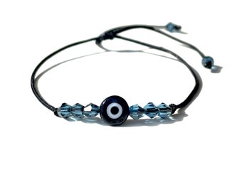 Black evil eye bracelet with sapphire blue crystals, Handmade-evil eye-protection-jewelry by Lucky Charms USA