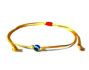 Evil eye golden string bracelet