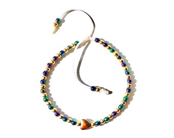 Heart charm iridescent beads bracelet