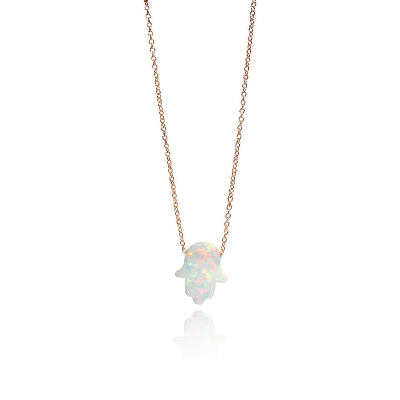 white opal hamsa hand pendant necklace rose gold-filled chain lengths 14inch 15inch 16inch 17inch 18inch 20inch 22inch 24inch Safe to get wet Handmade-hamsa-necklace-gift by Lucky Charms USA
collar opalo mano de fatima