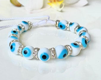 Evil eye beaded bracelet with sparkling zirconia on white fancy string, Elegant mal de ojo gifts by Lucky Charms USA