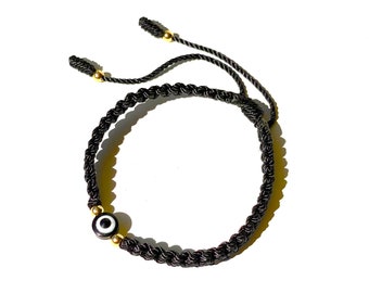 Handmade black evil eye bracelet you'll love with 14k gold beads