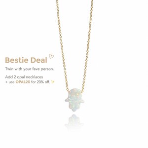Opal hamsa necklace centered on a clean background with visible promotional text reading ‘Bestie Deal — Twin with your fave person. Add 2 opal necklaces + use OPAL20 for 20% off. by Lucky Charms USA