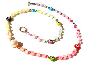 Enchanted rainbow choker with evil eyes rose quartz and fresh water pearl accented with gold-filled beads