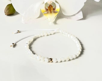 White beaded bracelet selenite crystals for calm and grounded vibes