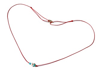 Pearl turquoise and gold-filled balls on red string a beautiful dainty versatile piece that can be worn as a bracelet choker and necklace