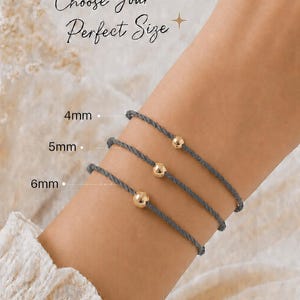 Lucky Charms USA slate gray twisted cord bracelets with polished gold beads in 4 mm, 5 mm and 6 mm size options.