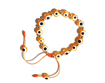 Orange evil eye bracelet with gold-filled beads handmade by Lucky Charms USA