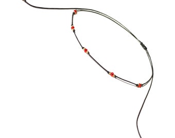 Red agate choker necklace on black string with gold-filled beads