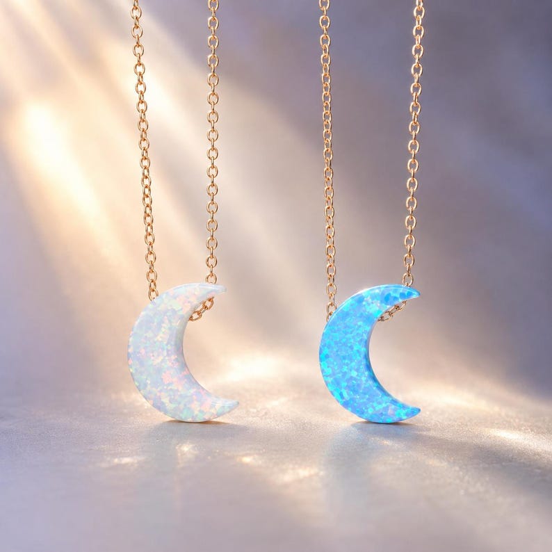 lucky charms usa showing their white and blue opal moon necklaces on a gold vermeil dainty cable chain.