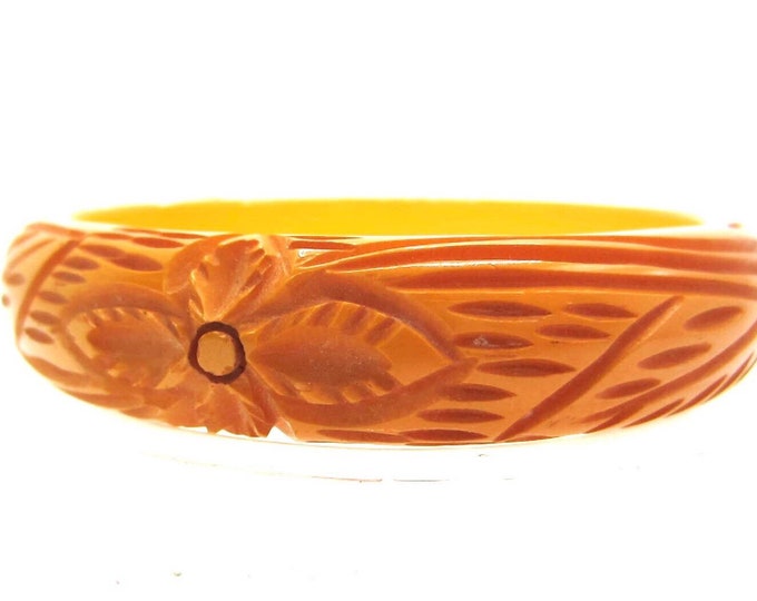 Heavily carved Bakelite tested Butterscotch Bangle with floral theme -21 gms of AWESOME vintage costume jewelry