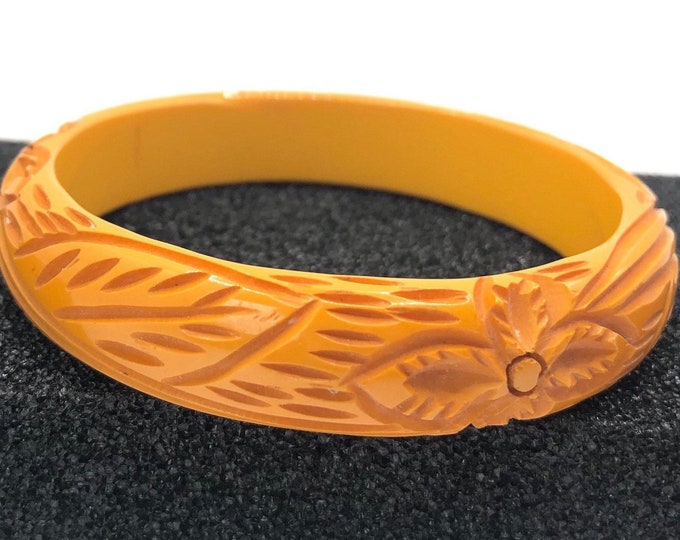 Heavily carved Bakelite tested Butterscotch Bangle with floral theme -21 gms of AWESOME vintage costume jewelry