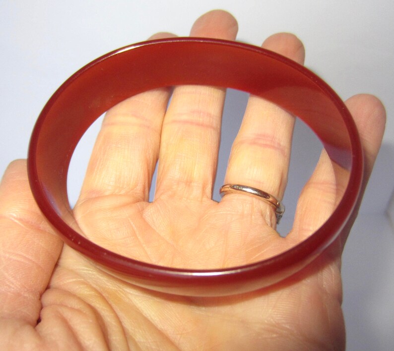 BAKELITE tested oxen blood cinnamon oval shaped Bangle Bracelet ~uniquely colored vintage costume jewelry